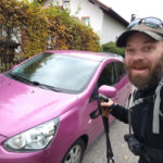 Tim Hills with a pink car